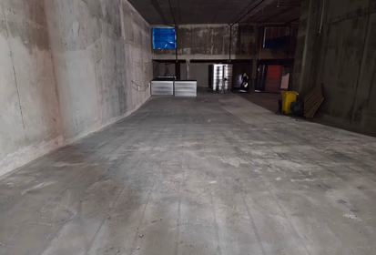 Finished concrete floor coating application